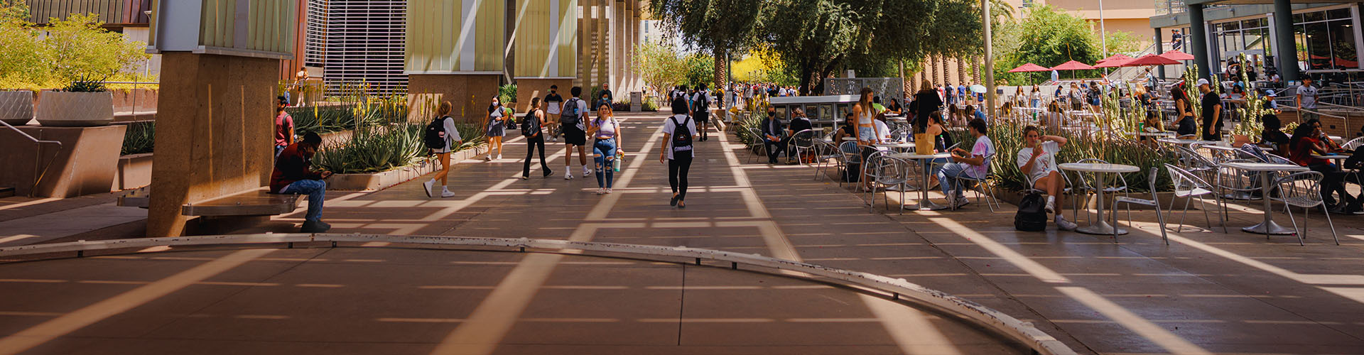 Students at ASU talking outside